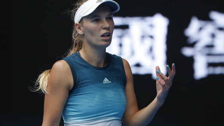Wozniacki sets up potential third-round showdown with Sharapova