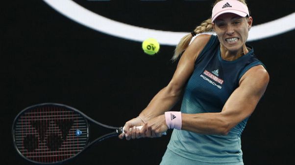 Kerber wins battle of left-handers to progress to third round Kerber wins battle of left-handers to progress to third round