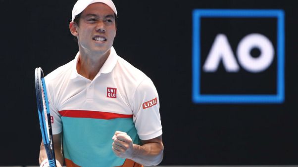 Nishikori survives huge scare against Karlovic Nishikori survives huge scare against Karlovic