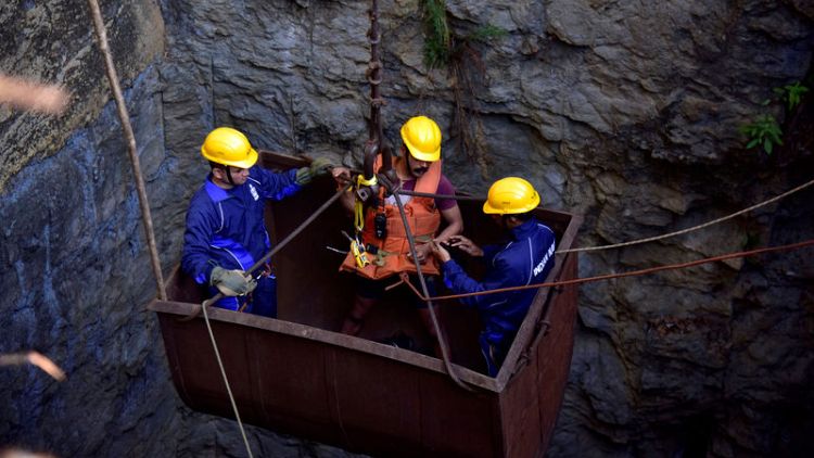 Divers locate one body in flooded Indian mine after 35 days