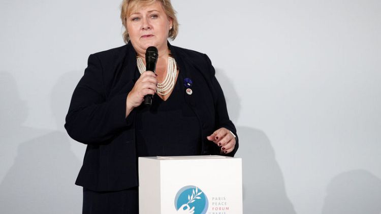 Norway PM Solberg to form majority government