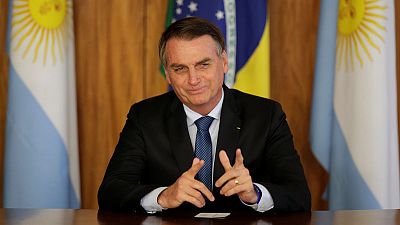 Brazil's Bolsonaro pledges action to 'restore democracy' in Venezuela Brazil's Bolsonaro pledges action to 'restore democracy' in Venezuela