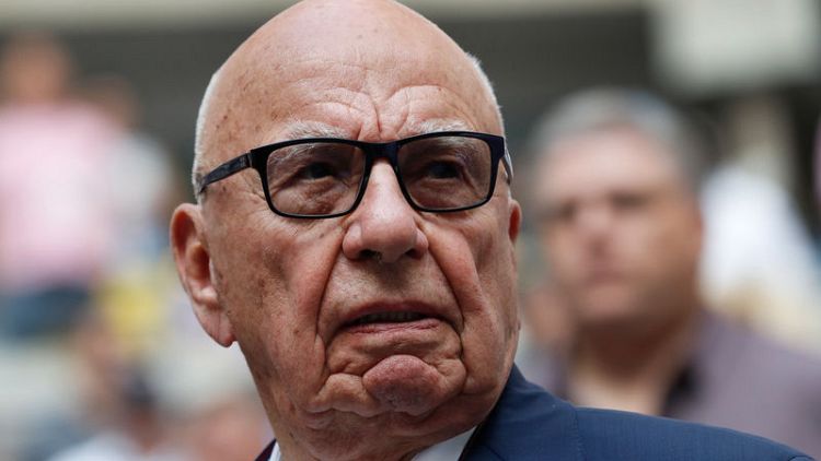 Murdoch seeks permission to merge Times and Sunday Times
