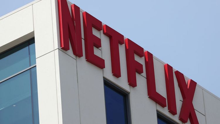 Netflix shares slip as weak forecast dampens investor optimism
