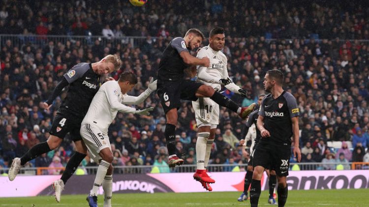 Madrid climb to third with vital win over Sevilla
