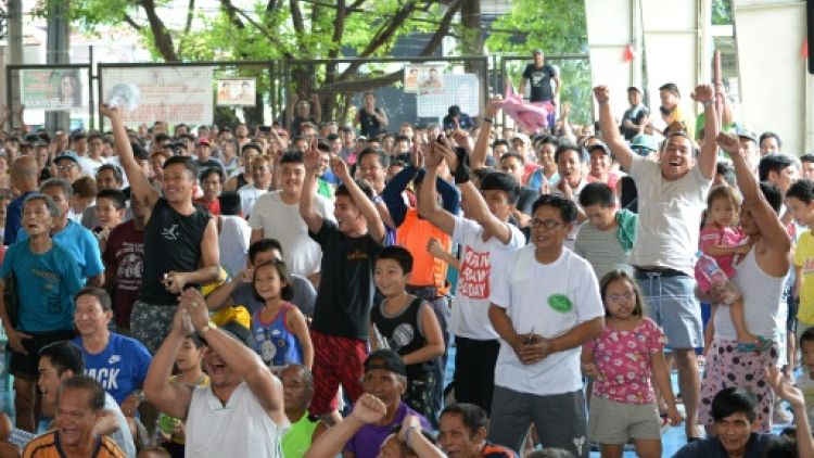 Les Philippins fiers de Pacquiao, le boxeur qui "se bonifie en vieillissant"