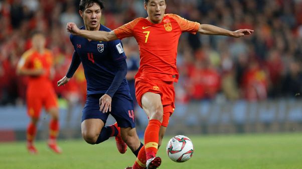 Lippi switch takes China into Asian Cup last eight Lippi switch takes China into Asian Cup last eight