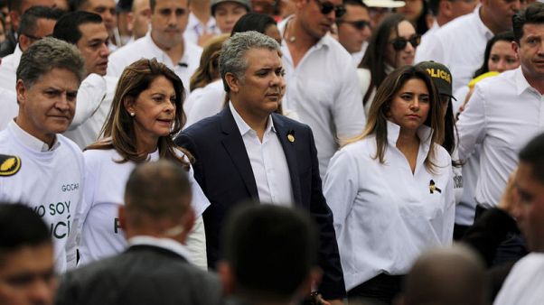 Thousands of Colombians march against violence after deadly car bomb Thousands of Colombians march against violence after deadly car bomb