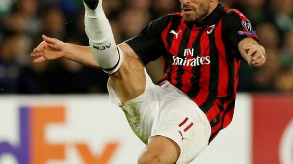 Soccer: Milan move into Champions League places with Genoa win Soccer: Milan move into Champions League places with Genoa win