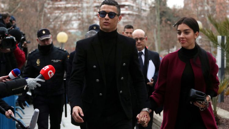 Soccer star Ronaldo, facing tax fraud accusations, arrives in Spanish court