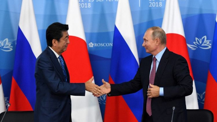 Russia detains 11 protesters ahead of Putin talks with Japan's Abe - monitor