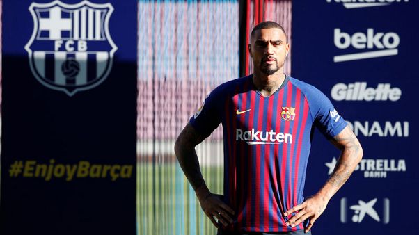 Boateng wants to 'win it all' after shock move to Barcelona Boateng wants to 'win it all' after shock move to Barcelona