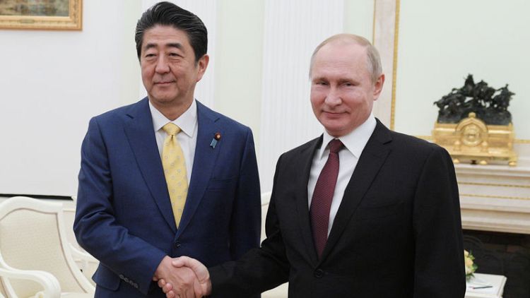 Russia says any deal to end land row with Japan needs public support