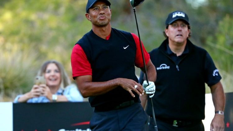 Golf - Tiger plans to make use of new flag rule