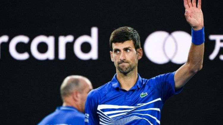 Open d'Australie: Djokovic rejoint Pouille en demi-finale après l'abandon de Nishikori