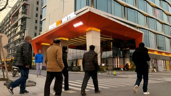 At Alibaba's futuristic hotel, robots deliver towels and mix cocktails At Alibaba's futuristic hotel, robots deliver towels and mix cocktails