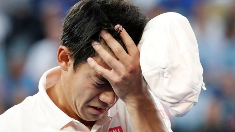Djokovic through to semi-finals after Nishikori retires