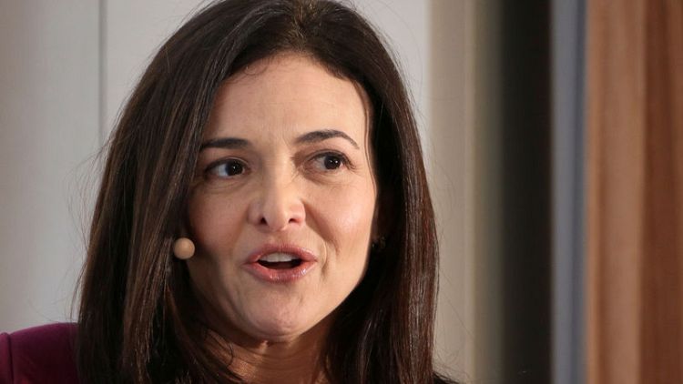 Sandberg says Facebook must earn back trust