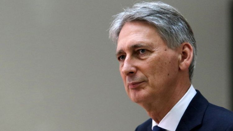 Hammond pulls out of event at Davos - FT