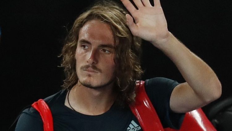 Dejected Tsitsipas bows out leaving Greek fans hoping for more
