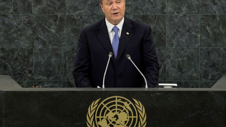 Ukrainian court sentences ex-president Yanukovych to 13 years in prison