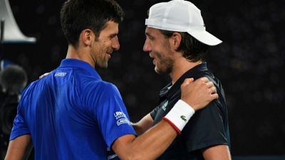 Open d'Australie: Pouille sèchement battu par Djokovic, qui rejoint Nadal en finale Open d'Australie: Pouille sèchement battu par Djokovic, qui rejoint Nadal en finale