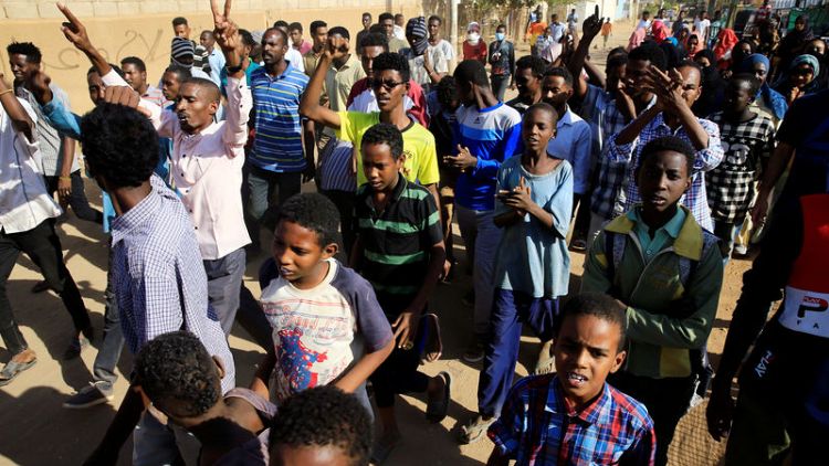 Sudan opposition leader says Bashir 'must leave' as hundreds march
