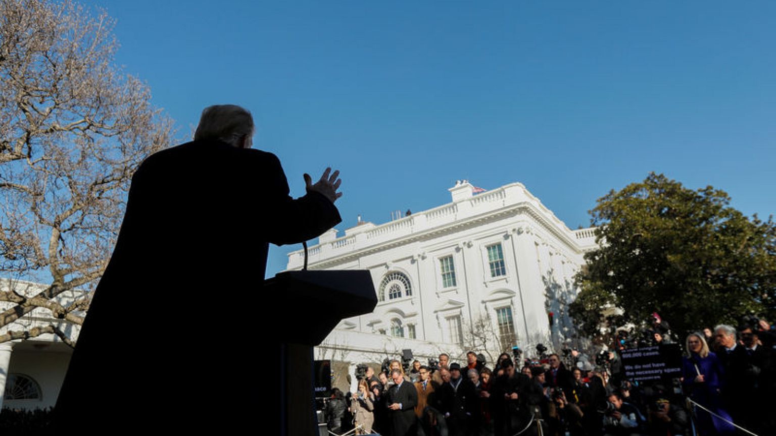 Trump wounded by border wall retreat in deal to end shutdown