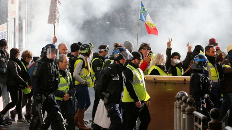 French 'yellow vests' defy Macron with fresh protests