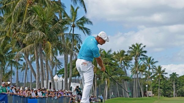DeChambeau leads going into final round in Dubai DeChambeau leads going into final round in Dubai