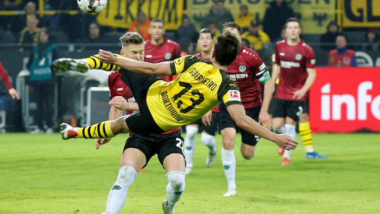 Dortmund beat Hanover 5-1 to go nine points clear