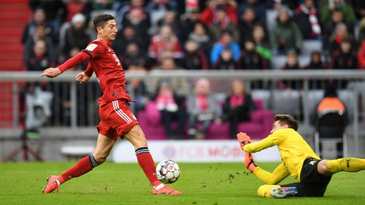 Bayern beat Stuttgart to stay six points off Dortmund