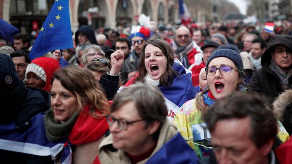 'Red scarves' march in Paris in riposte to 'yellow vests' 'Red scarves' march in Paris in riposte to 'yellow vests'