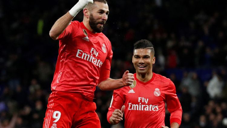 Solari toasts in-form Benzema after win at Espanyol