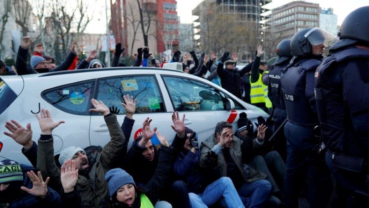 Madrid taxis block major road in biggest anti-Uber protest yet