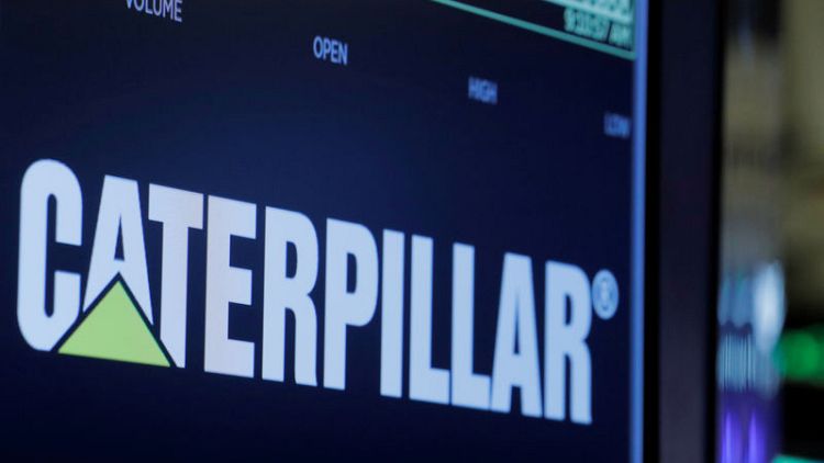 Caterpillar fourth quarter profit misses estimate badly, shares slide