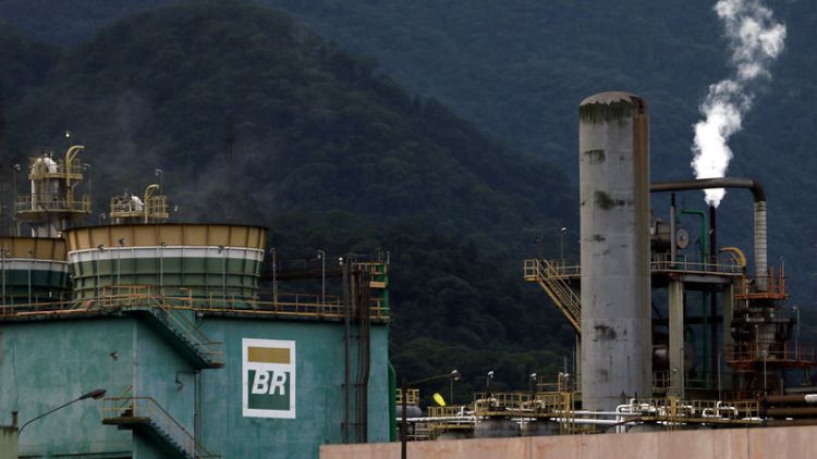 Brazil official says Petrobras, BB and Caixa should sell subsidiaries