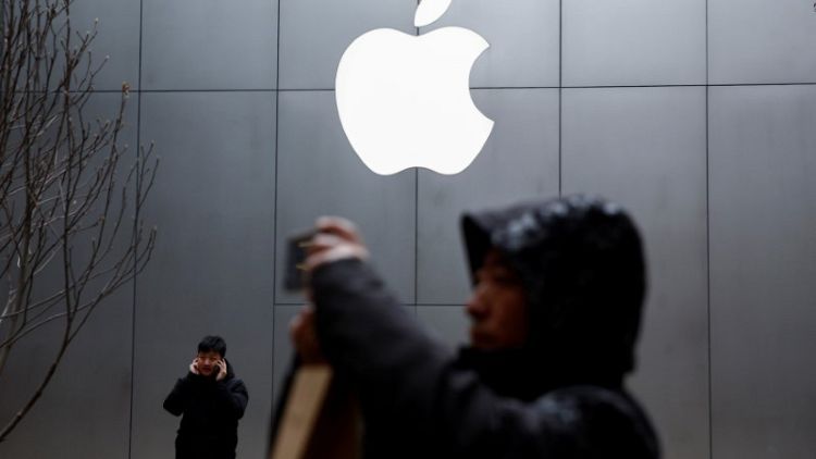 Apple sees U.S.-China tensions easing, services business growing