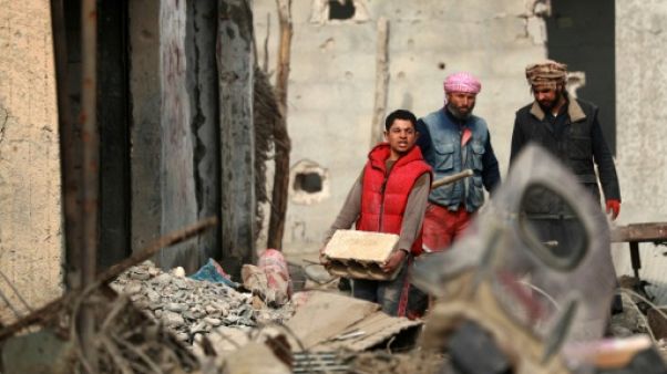 Après le départ de l'EI, les Syriens de Hajine veulent rentrer chez eux Après le départ de l'EI, les Syriens de Hajine veulent rentrer chez eux