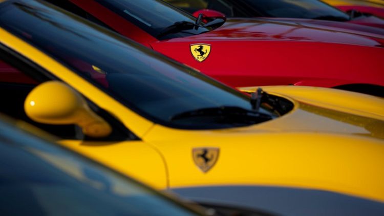 Ferrari fourth quarter core earnings up 6 percent, shares rise