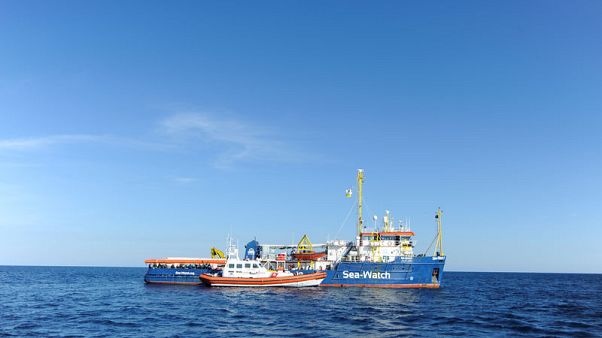 Migrants disembark in Italy as Rome vows to continue hard line Migrants disembark in Italy as Rome vows to continue hard line