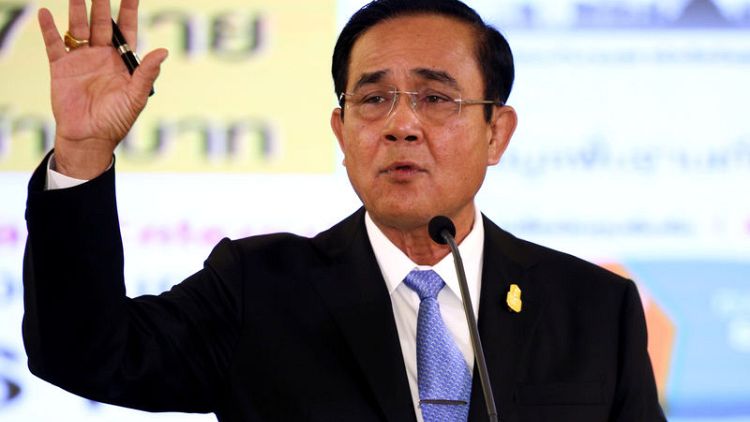 Thai junta chief touts economy, coy on candidacy as elections loom