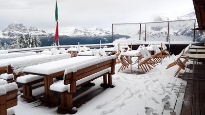 Acqua alta a Venezia, neve a Cortina Acqua alta a Venezia, neve a Cortina