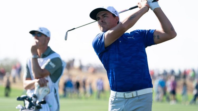 Golf - Phoenix leader Fowler cannot shake off Thomas, on or off the course