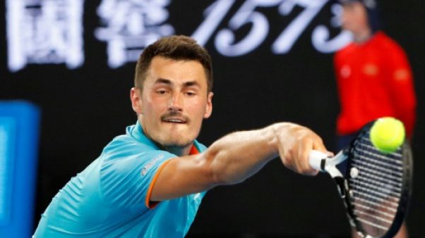 Coupe Davis: échanges musclés entre Tomic et le capitaine australien Lleyton Hewitt Coupe Davis: échanges musclés entre Tomic et le capitaine australien Lleyton Hewitt