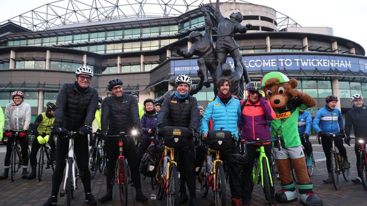 Adventurers saddle up for seven-month cycle to World Cup