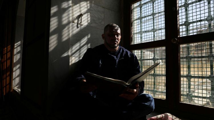 Israeli mosque prayer caller fired over photos in bodybuilder outfit