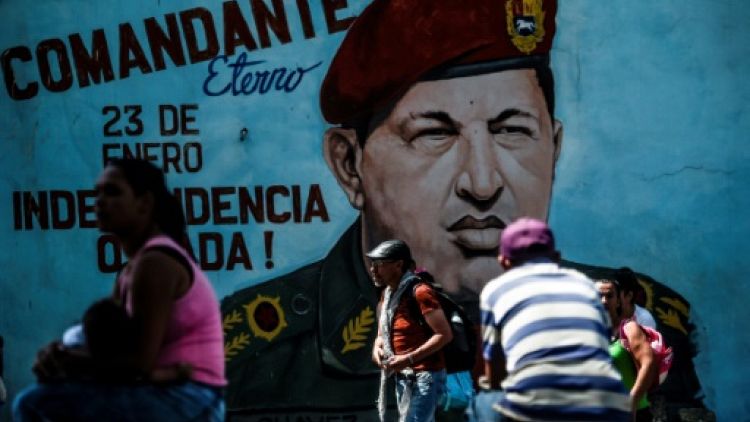 Le portrait d'Hugo Chavez peint sur un mur à Caracas, le 29 janvier 2019
