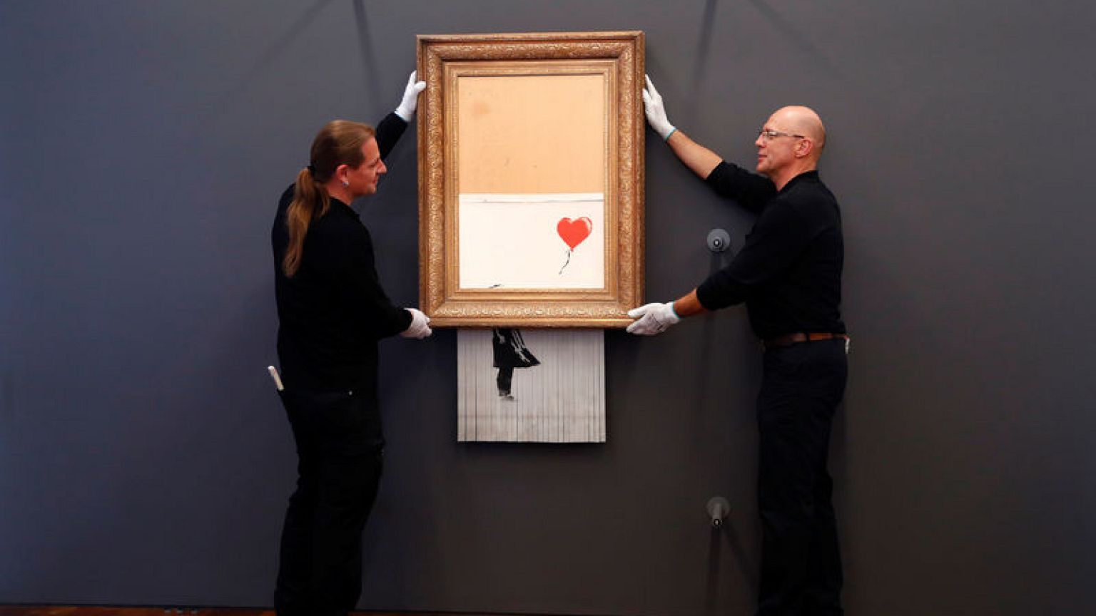 Self-shredding Banksy painting goes on display in Germany