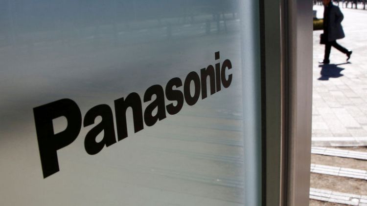 Panasonic shares plunge after profit warning, Tesla's Maxwell deal
